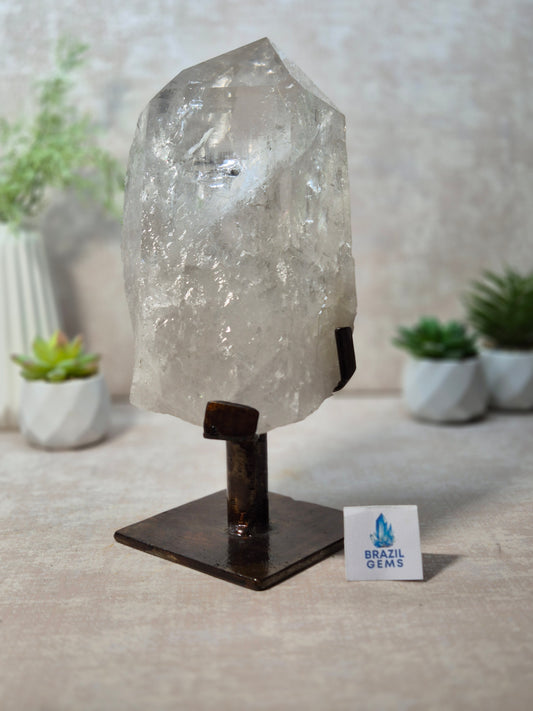 Clear Quartz Point on the stand