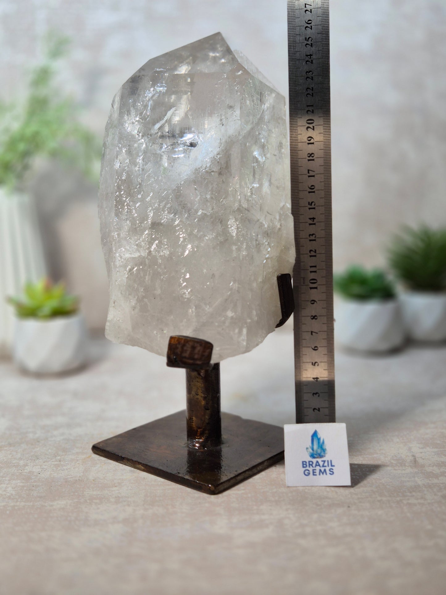 Clear Quartz Point on the stand