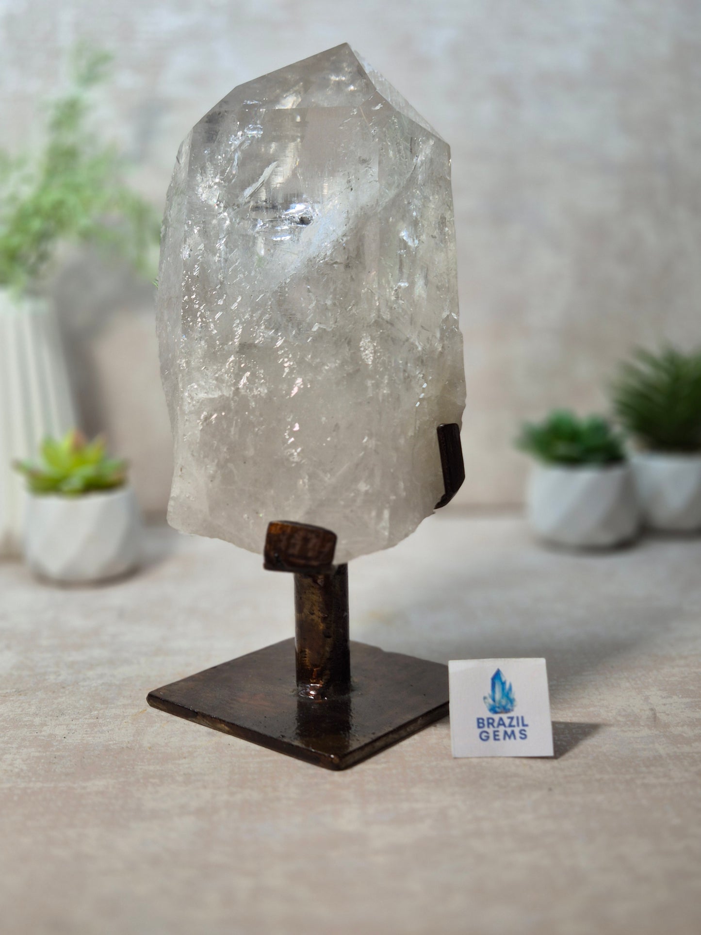 Clear Quartz Point on the stand