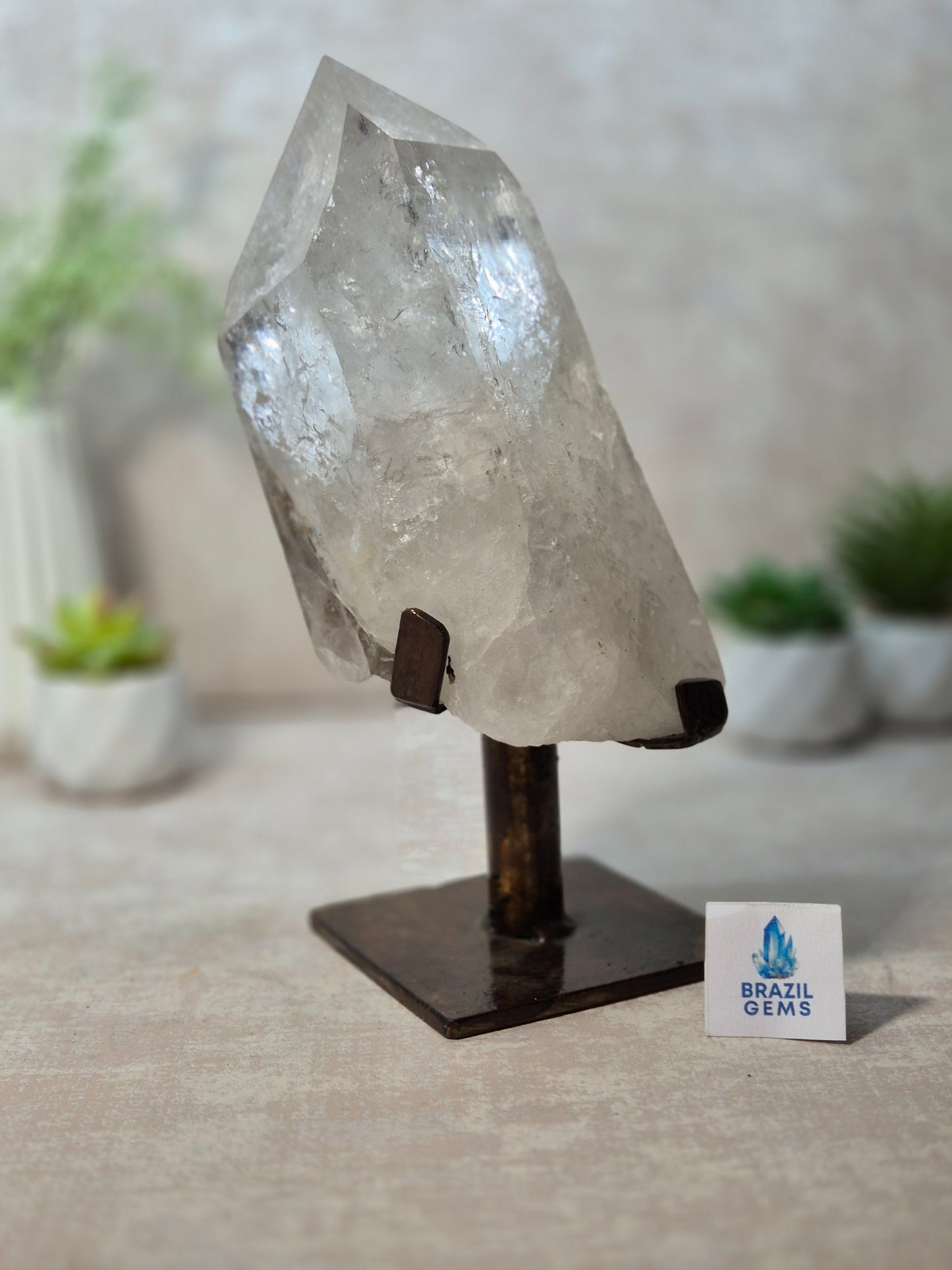 Clear Quartz Point on the stand