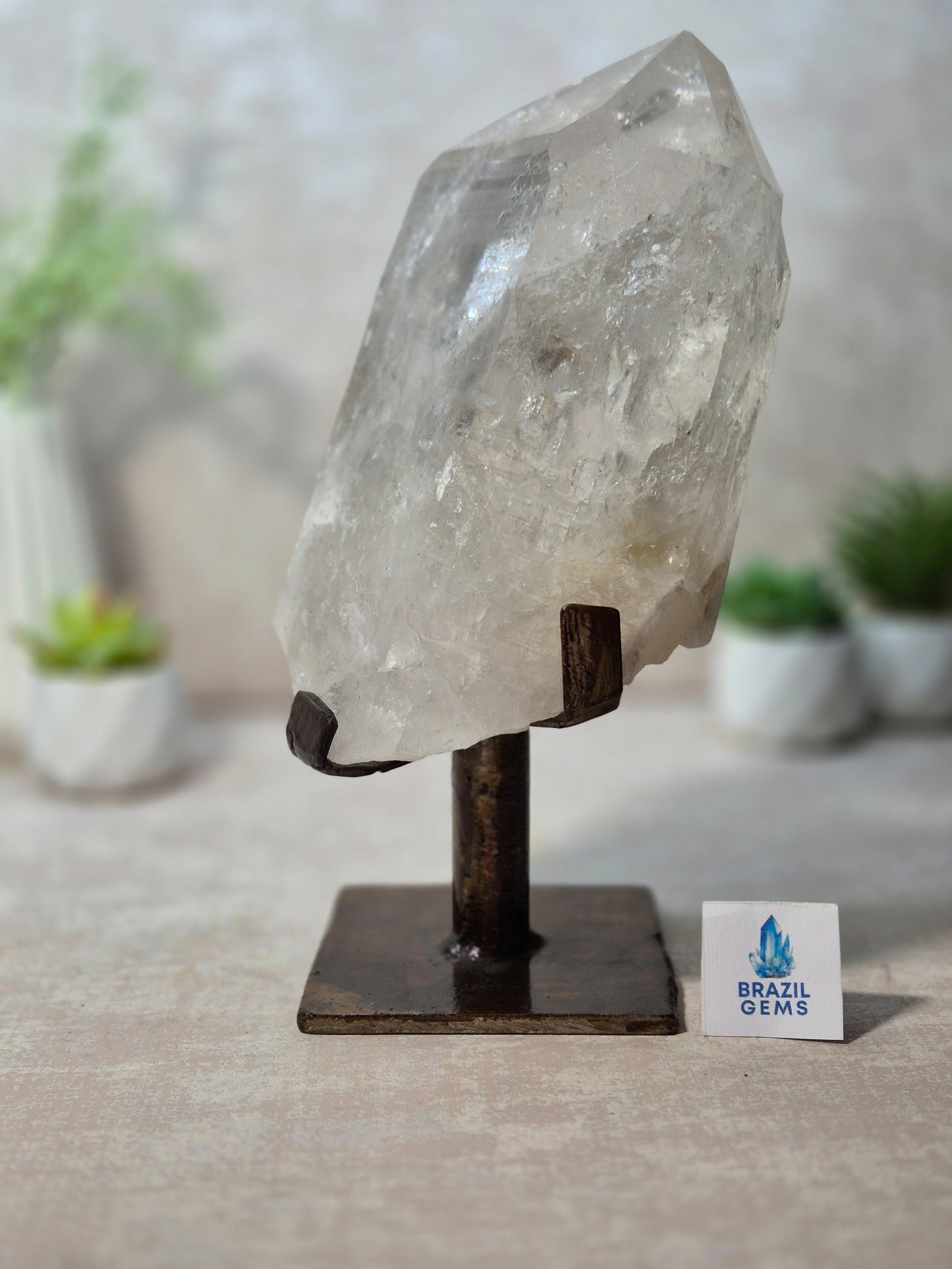 Clear Quartz Point on the stand