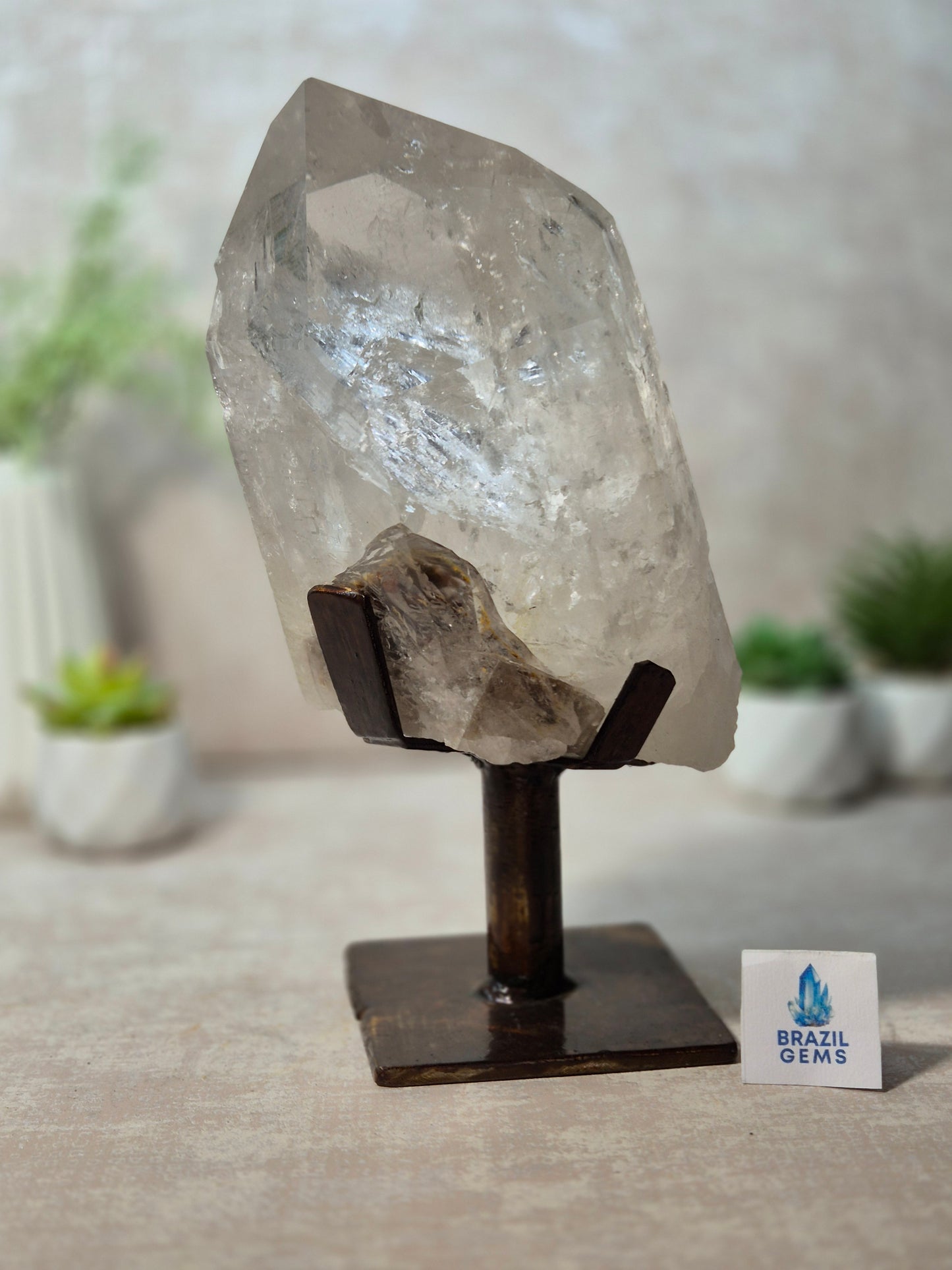 Clear Quartz Point on the stand