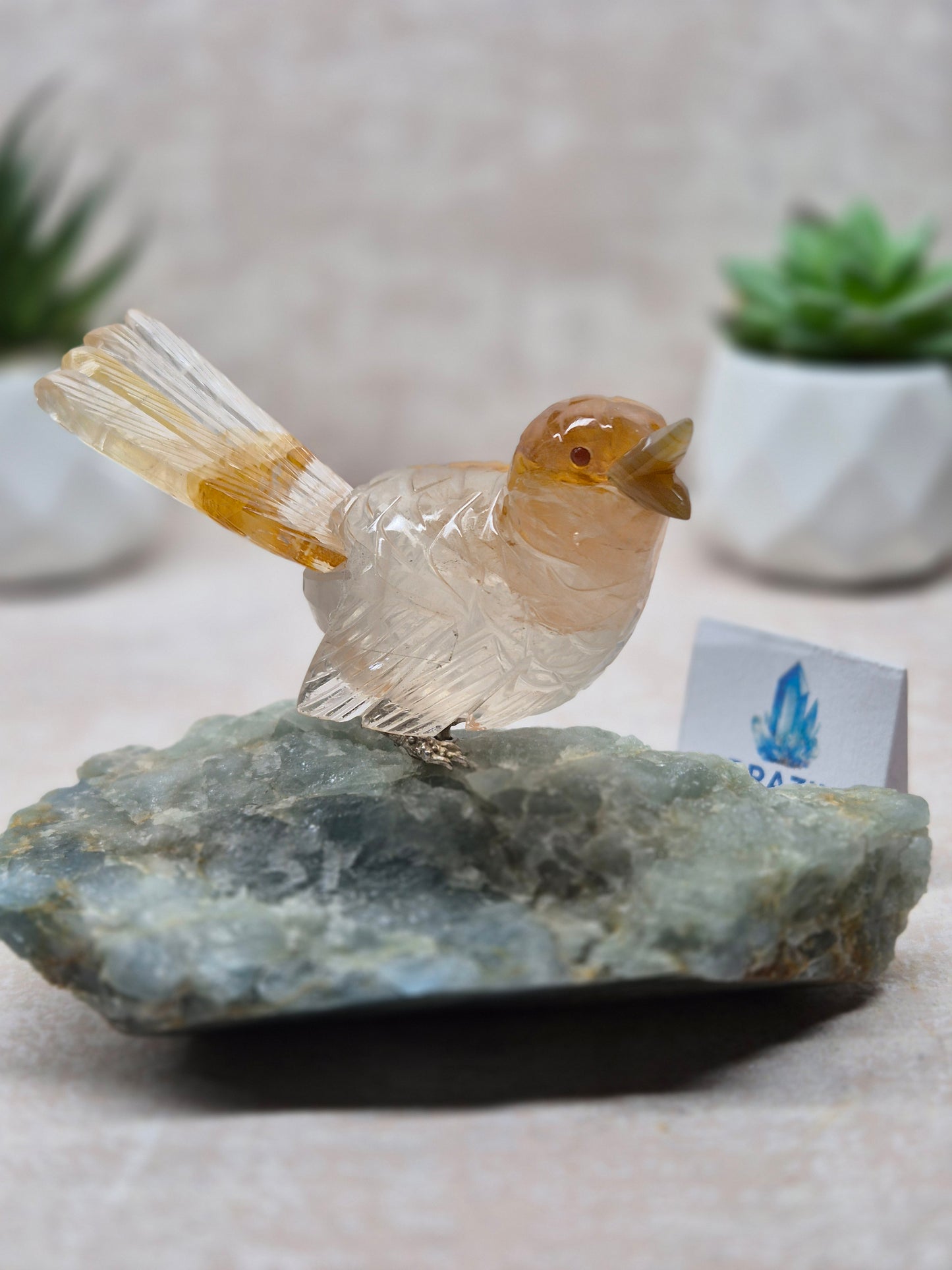 Yellow Hematoid Bird on Aquamarine Base