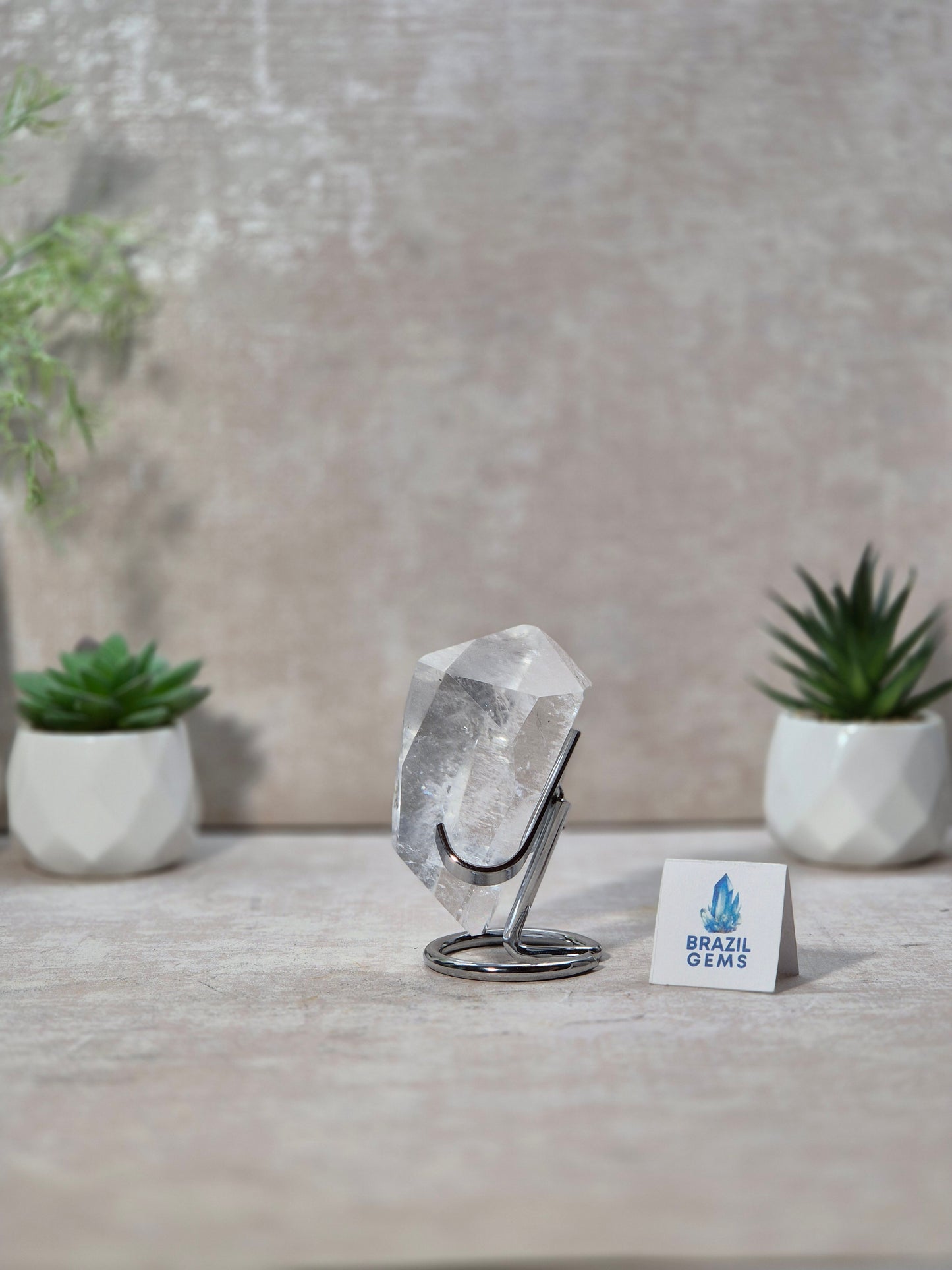 Free Form High Grade Clear Quartz on stand