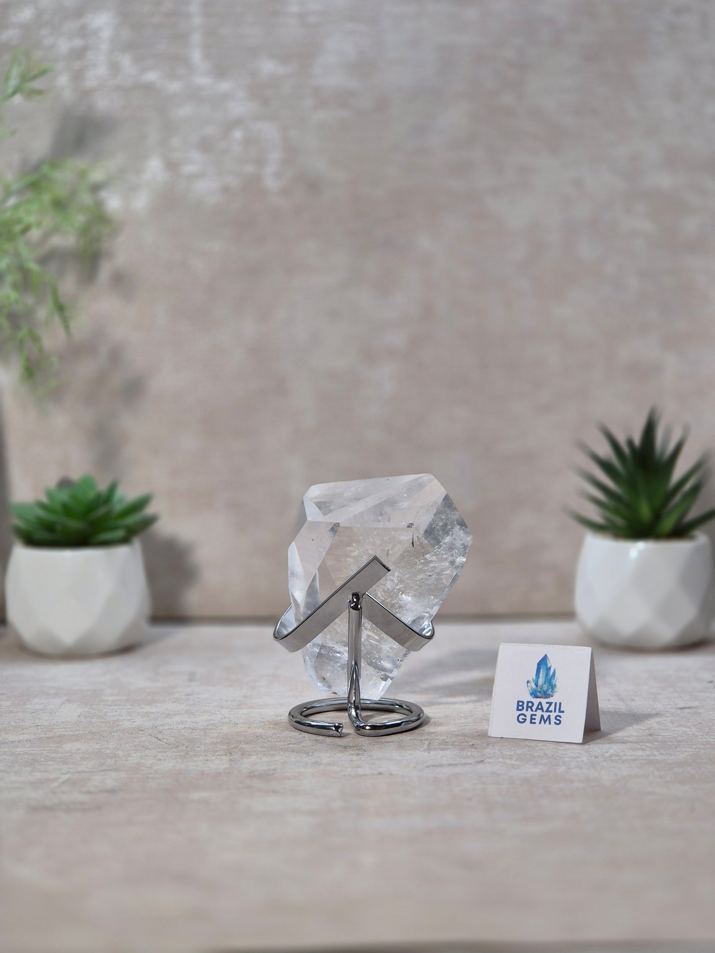 Free Form High Grade Clear Quartz on stand