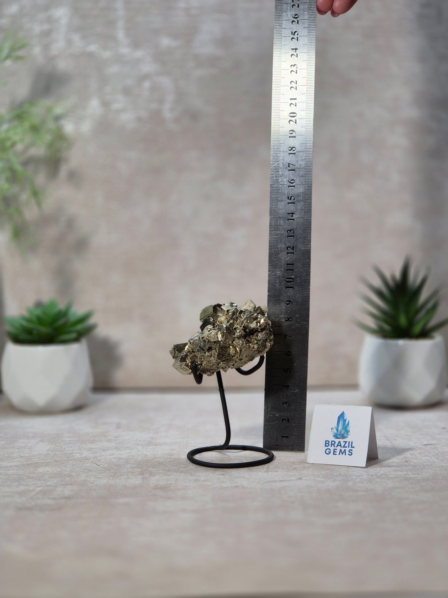 Pyrite with Calcite Cube on stand