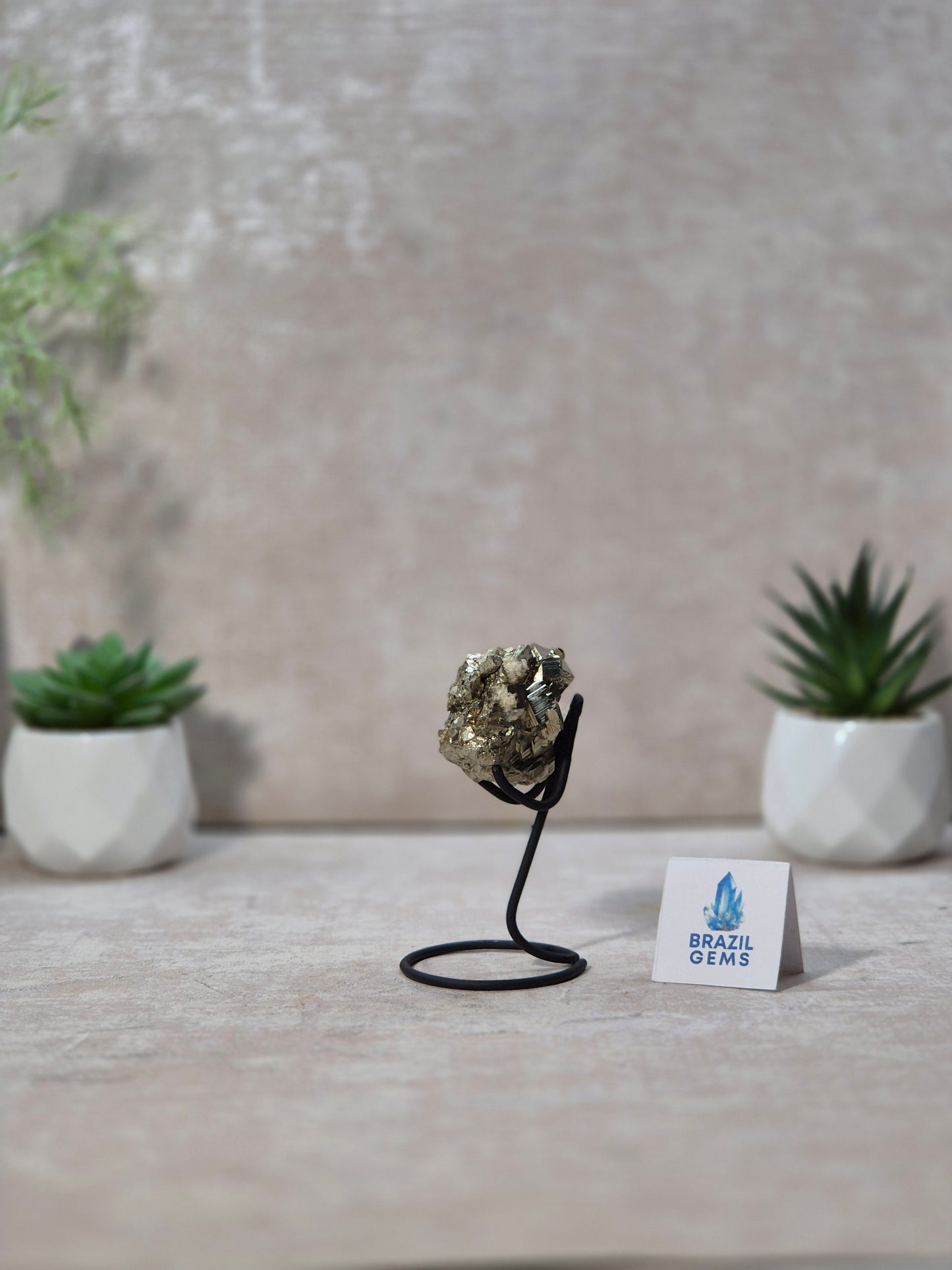 Pyrite with Calcite Cube on stand