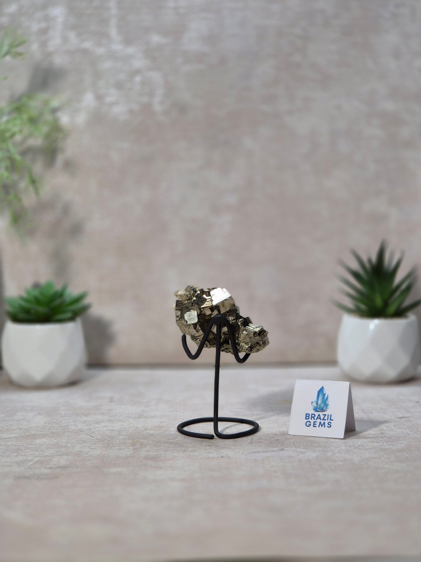 Pyrite with Calcite Cube on stand