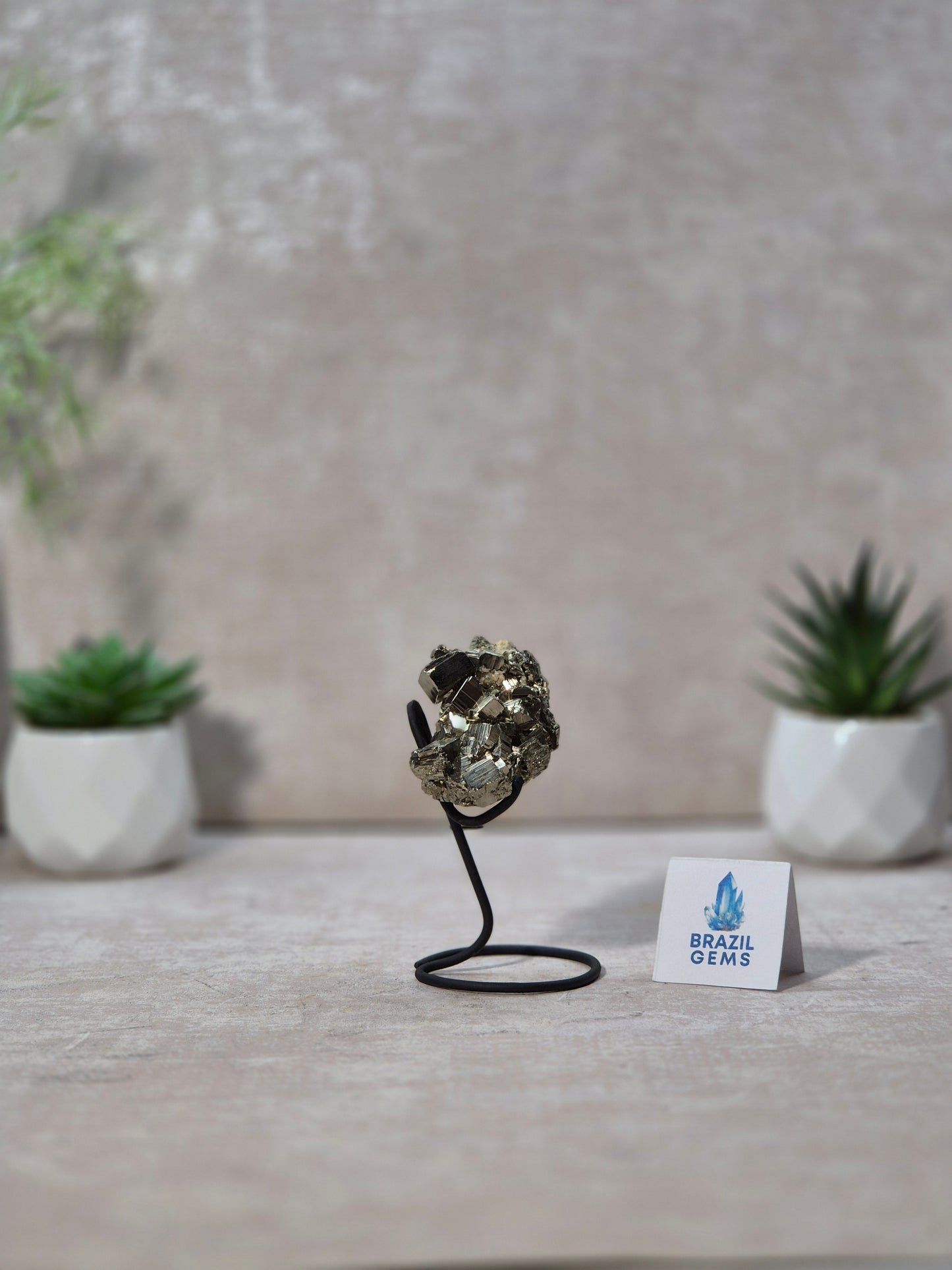 Pyrite with Calcite Cube on stand
