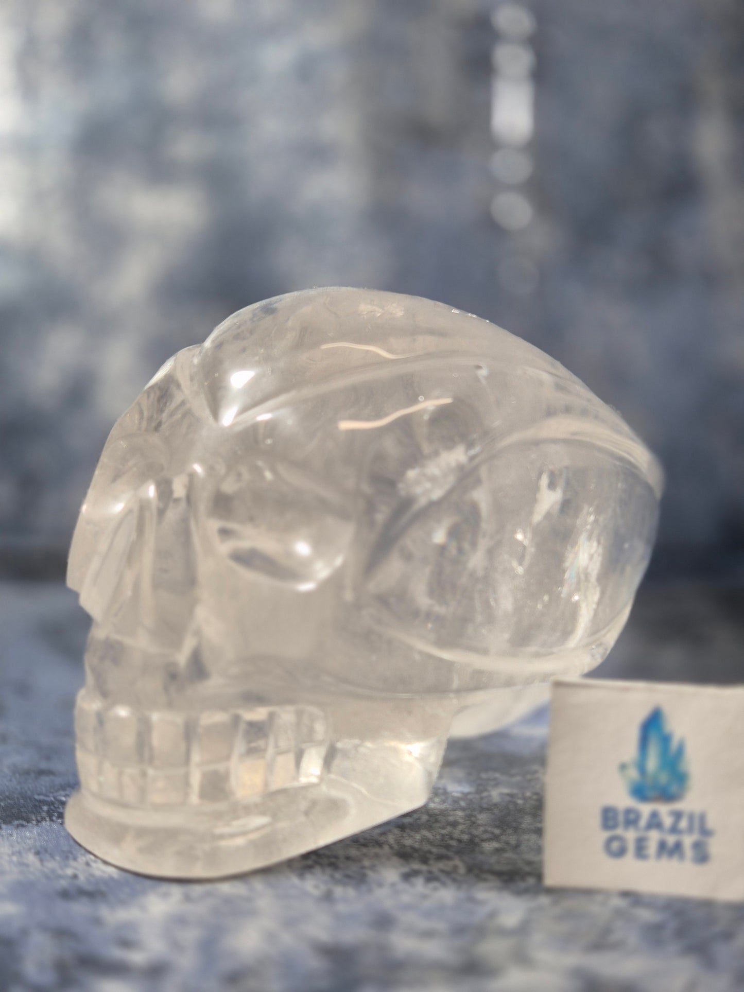 Lemurian Quartz Traveller Skull with Rainbow